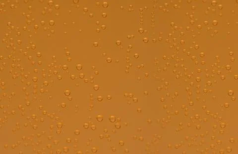 Macro shot of orange effervescent bubbles of calcium and vitamin C effervesce Foto stock