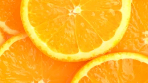 Macro shot of orange slices, rotate. Top view of fresh citrus orange. Healt.. Stock Footage 273676454