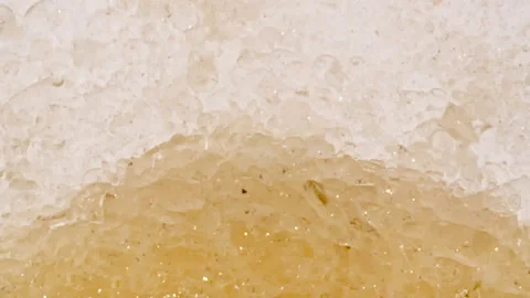 Macro Shot of Particles made of Powder, Bubbles in Water, Cosmetic Texture in Stock Footage 264578518