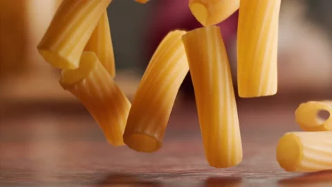 Macro shot of pasta falling and bouncing Stock Footage 156787030