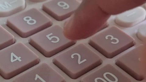 Macro shot of person hand using digital calculator Stock Footage 337831188