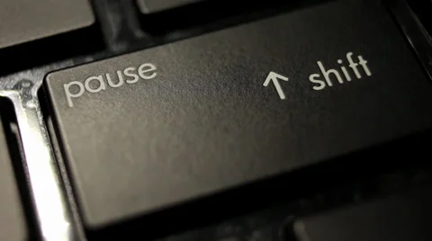 Macro shot person hitting shift key on keyboard Video stock 28600762