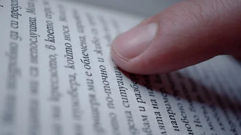 Macro shot of a person reading a book. Stock Footage 238775088