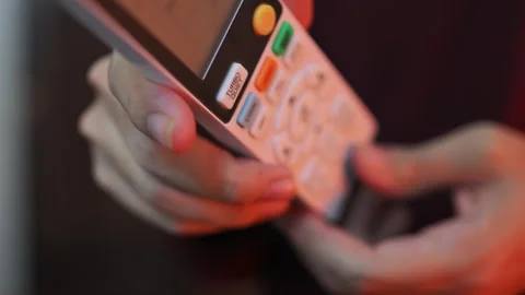 Macro Shot of Person Using AC Remote Controller for Temperature Settings Stock Footage 337847544
