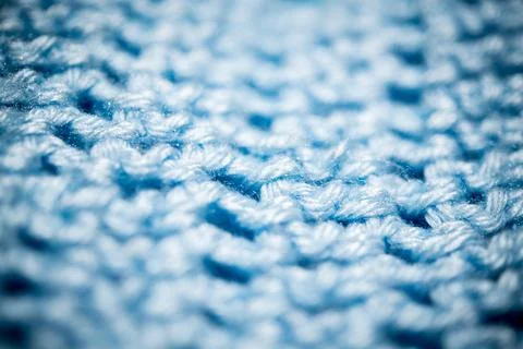 Macro Shot Of A Piece Of Deep Blue Knitted Fabric Stock Photos