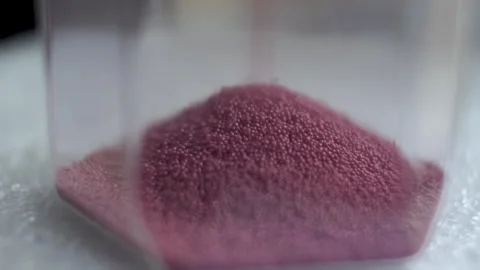 Macro Shot Of Pink Sand Particles In Hourglass Sand Timer Clock. Locked Off Stock Footage 240691035