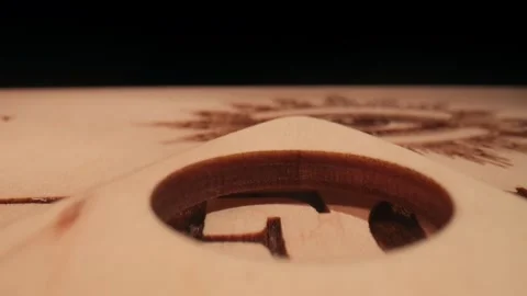 Macro shot of a planchette moving across ouija board spelling out words and 스톡 동영상 248225518