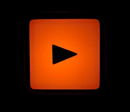 Macro shot of the "play" button Photos