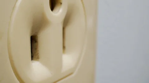 Macro shot of a plug going into a socket Stock Footage 111809662
