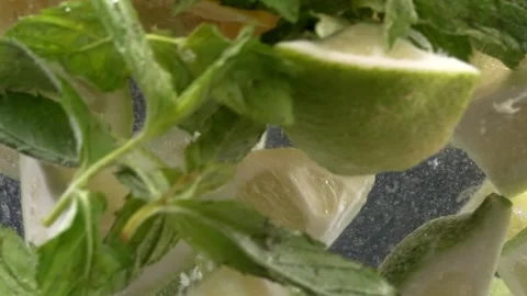 Macro Shot Preparation of Fresh Lemonade Stock Footage 246917583