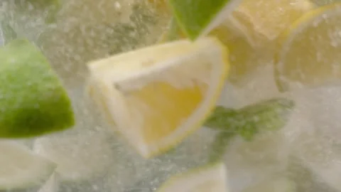 Macro Shot Preparation of Fresh Lemonade Stock Footage 246971612