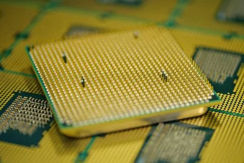 Macro shot of processor pins highlighting tiny details of computer microarc.. 스톡 사진