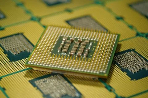 Macro shot of processor revealing intricate pin layout for electrical signals Stock Photos
