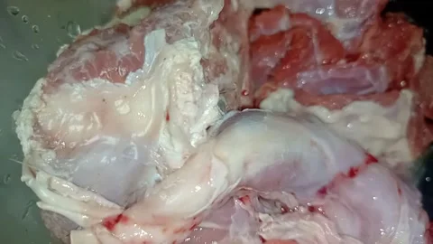 Macro shot of raw beef steak slices with beautiful fat marbling texture Stock Footage 336796007