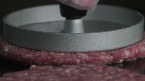Macro shot of raw burger on grill. Stock Footage 140326682