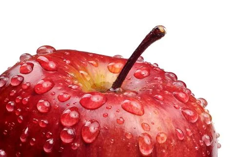 Macro shot of red apple with drops of water Stock Photos