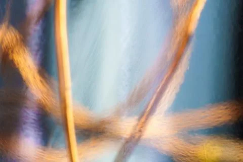 Macro shot of red copper wires behind a bluish glass surface Stock Illustration