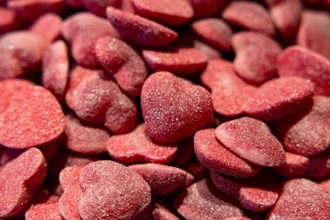 Macro Shot of Red Heart-Shaped Gummy Candies with Sugar Coating Stock Photos