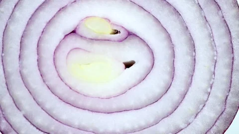 Macro Shot of Red Onion Cross Section Showing Concentric Layers and Vibrant.. Stock Footage 320470090