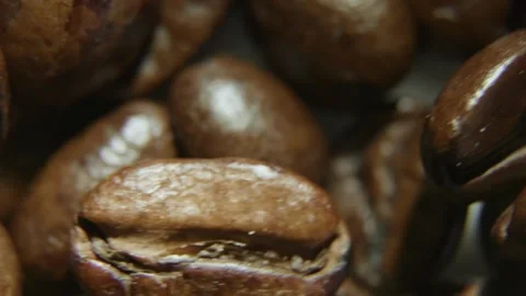Macro Shot of Roasted Coffee Beans on Dark Surface. Видео 333629330