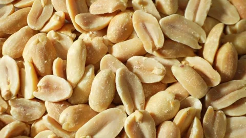 A macro shot of roasted peanuts. Stock Footage 275666476