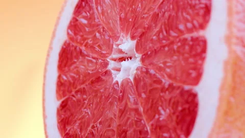 Macro shot of rotating grapefruit flesh structure. Close-up fruit texture. Stock Footage 150391012