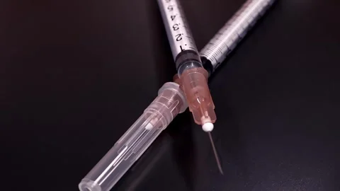 Macro shot of rotating syringe. Stock Footage 294596522