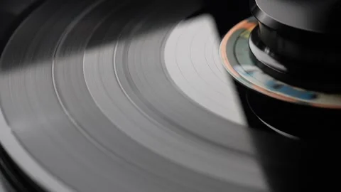 Macro Shot of Rotating Vinyl Record on Turntable Stock Footage 333756766