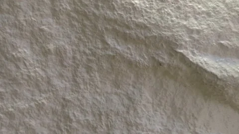Macro Shot of Rough White Stone Texture - Natural Limestone Surface Stock Footage 329240092