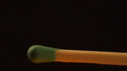 Macro shot set fire to match on a black background. Stock Footage 108985654