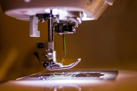 Macro shot of sewing machine with shallow depth of field Stock Photos