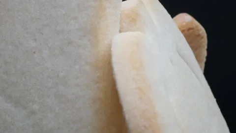 Macro shot of shortbread cookies rotating Stock Footage 252556898