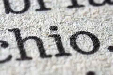 Macro shot showing text printed on paper texture Stock Photos