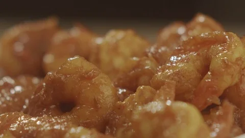 Macro shot of shrimp fried over fire. Slow Motion Video Stock Footage 113611867
