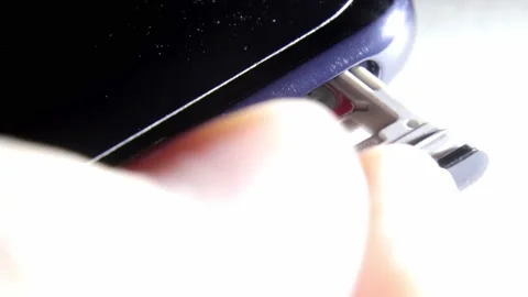 Macro shot of SIM card being inserted into 5G smartphone Stock-Footage 158370317
