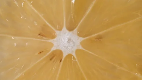 Macro Shot of Slice Lemon Fruit and Rotate. Closeup Fresh Citrus Lemon. Healthy Video stock 159015327