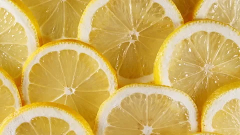 Macro Shot of Sliced Lemons Fruit Slices and Rotate. Lemons Fruit Pattern Stock Footage 162655892