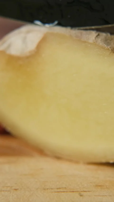 Macro shot of slicing ginger showing texture Stock Footage 322218279