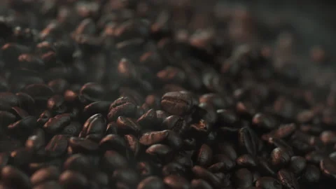 Macro shot Smoke emanating from the roasting of coffee beans slow motion. Stock Footage 196676046