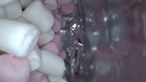 Macro shot soft small marshmallows in a package. Stock Footage 160443056