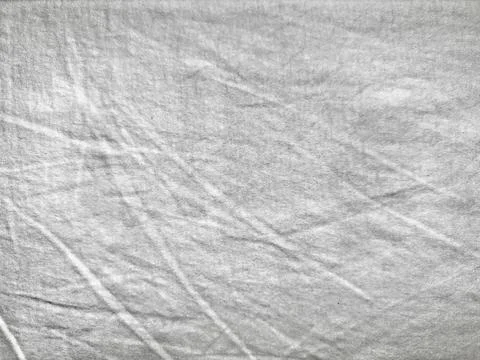 Macro shot of soft wrinkled light grey linen fabric texture for web design ba Stock Photos