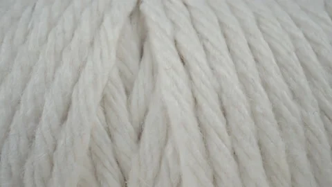 Macro shot spool hemp rope dolly extreme closeup roll of thread, white threads Stock Footage 233894669