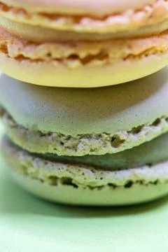 Macro shot of stack of macarons over green mint background Fotos Stock
