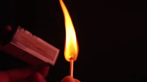 Macro Shot of Striking a Matchstick: A Concept of Inspiration and Sparking Ideas 動画素材 337736935