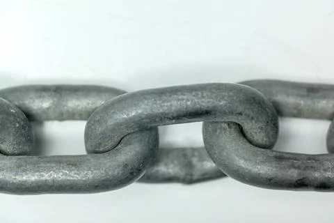 Macro shot of strong, weathered galvanized steel chain links connected toge.. Stock Photos