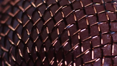 A macro shot of a studio microphone with contrasting fill light. Stock Footage 250967236