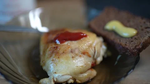 Macro shot of succulent roasted chicken with ketchup Stock Footage 331198721