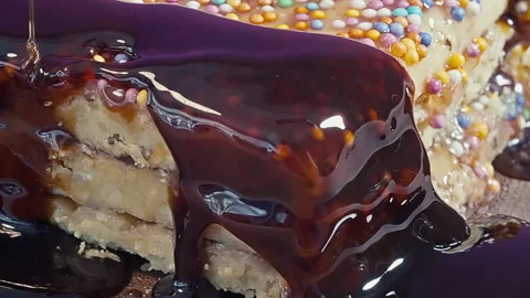 Macro Shot of Syrup Pouring Over Peruvian Turron de Doña Pepa. Stock Footage 339079264