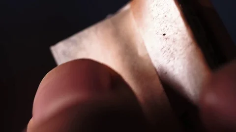 Macro shot. Taking paper for a joint. Stock Footage 82877412