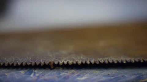 Macro shot of the teeth of a hand saw Vídeo Stock 119185785